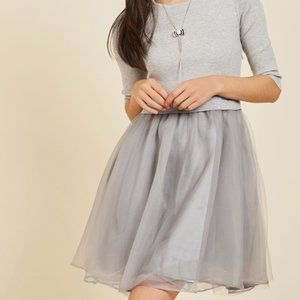 gray dress with a tulle skirt